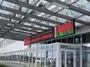 В Китайско-Белорусском индустриальном парке "Великий Камень" над главным входом на предприятие ООО «ЗУМЛИОН БЕЛ-РУС» установлен полноцветный светодиодный экран
